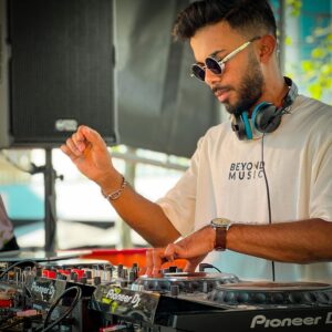 A Man in White Shirt Wearing Black Sunglasses